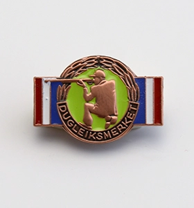Dugleiksmerket bronse emaljert